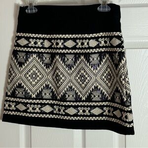 En Creme mini skirt, size small , in excellent condition.